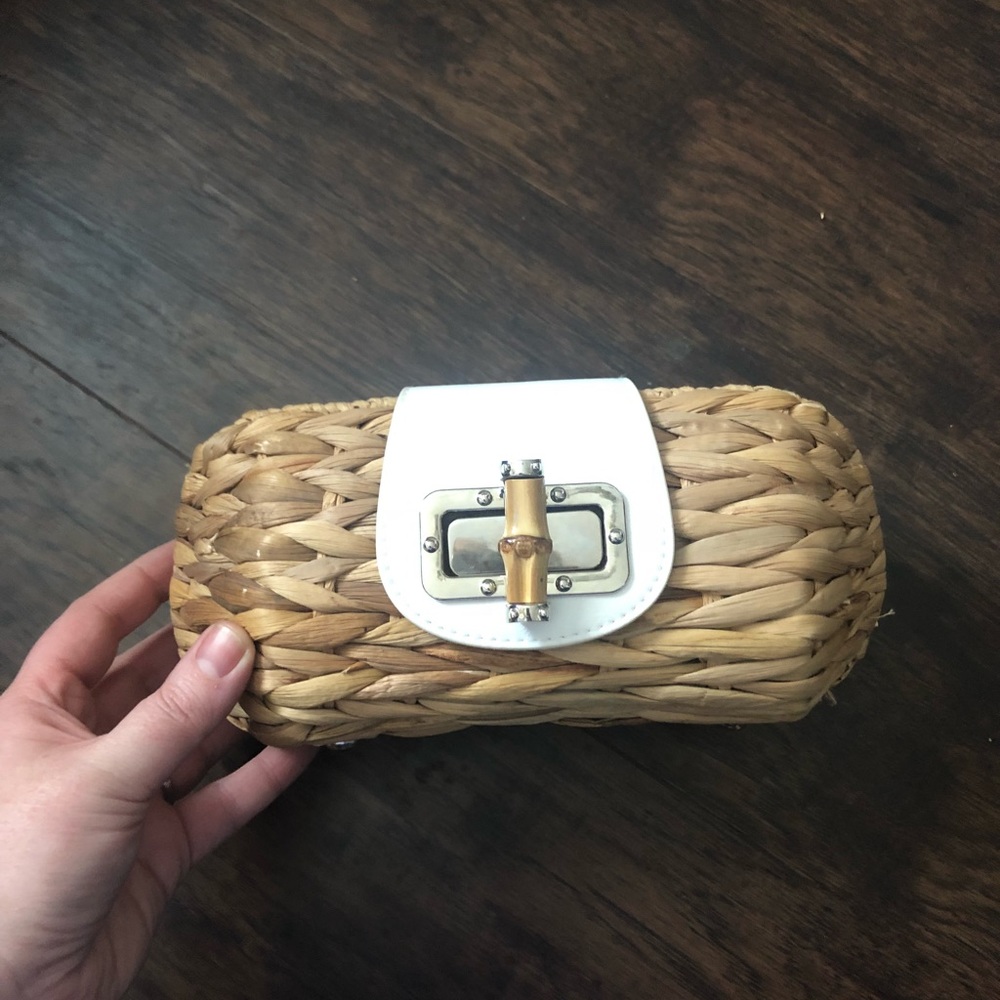 Clutch with wrist strap.